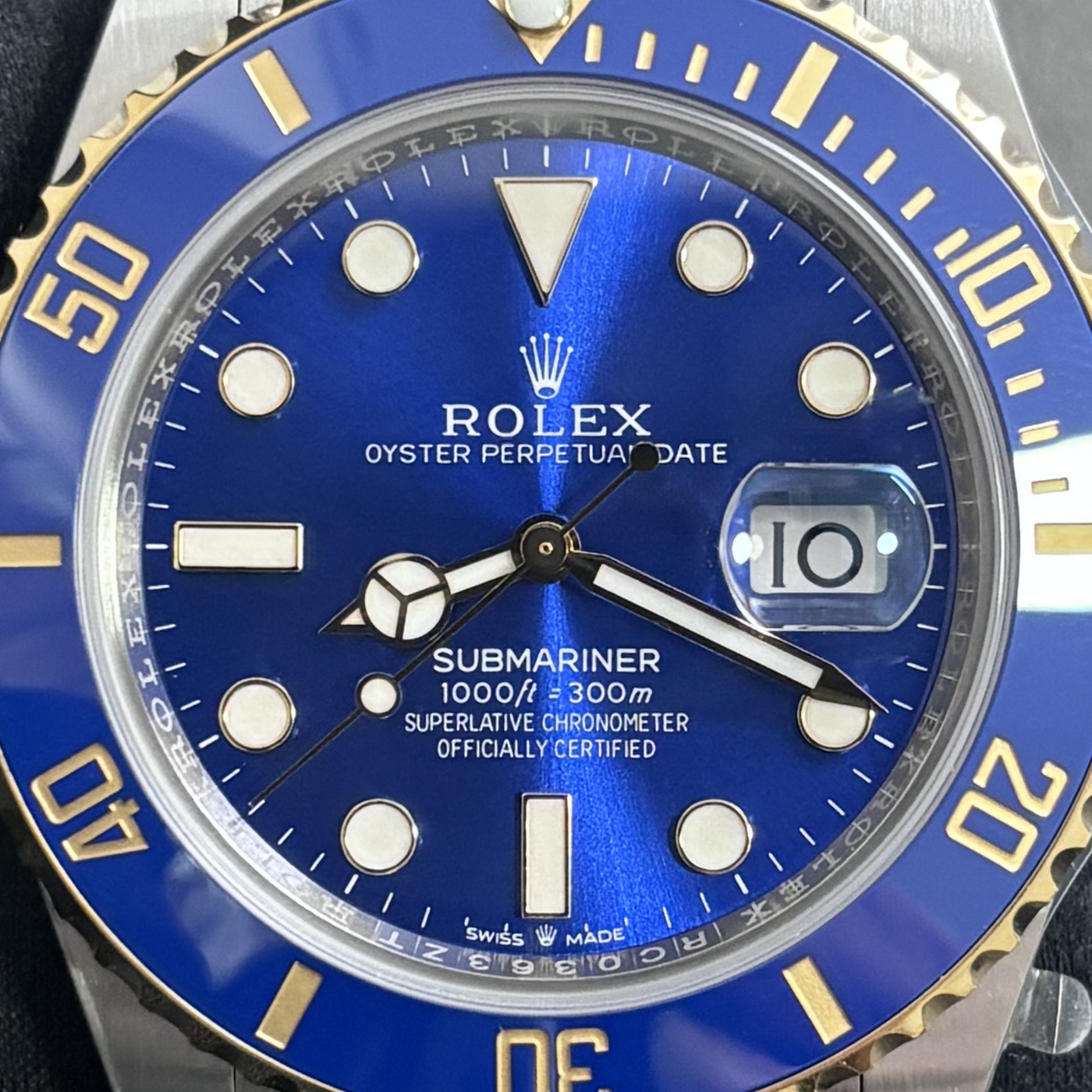 P15 · Camera geometry corrected. Image rotated approximately 0.4° clockwise at the dial centre; perspective and unequal image scaling normalized to a circular dial reference using the saved printed minute-track reference. Recentered and resampled to 1400 × 1400 pixels. No correction for crystal refraction or raised bezel/hand geometry.
