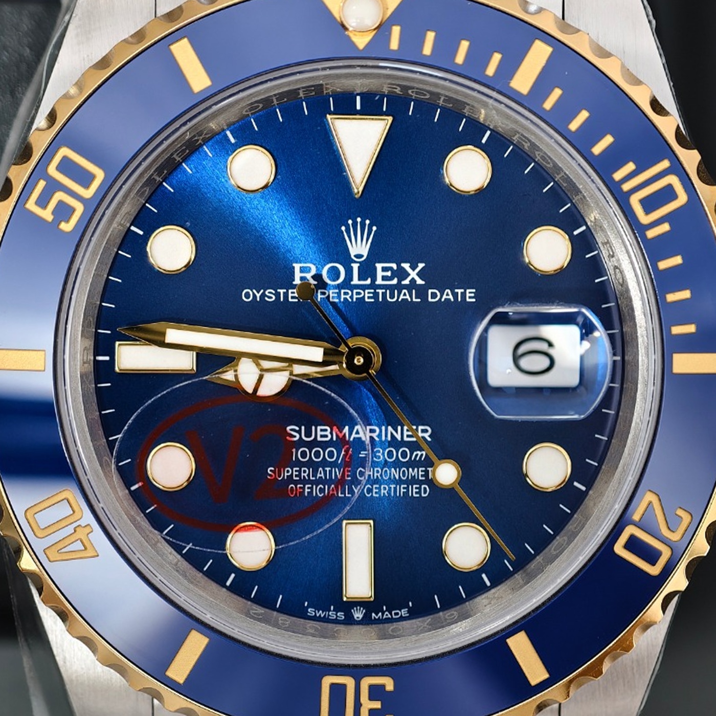 P02 · Camera geometry corrected. Image rotated approximately 0.5° counterclockwise at the dial centre; perspective and unequal image scaling normalized to a circular dial reference using the saved printed minute-track reference. Recentered and resampled to 1400 × 1400 pixels. No correction for crystal refraction or raised bezel/hand geometry.