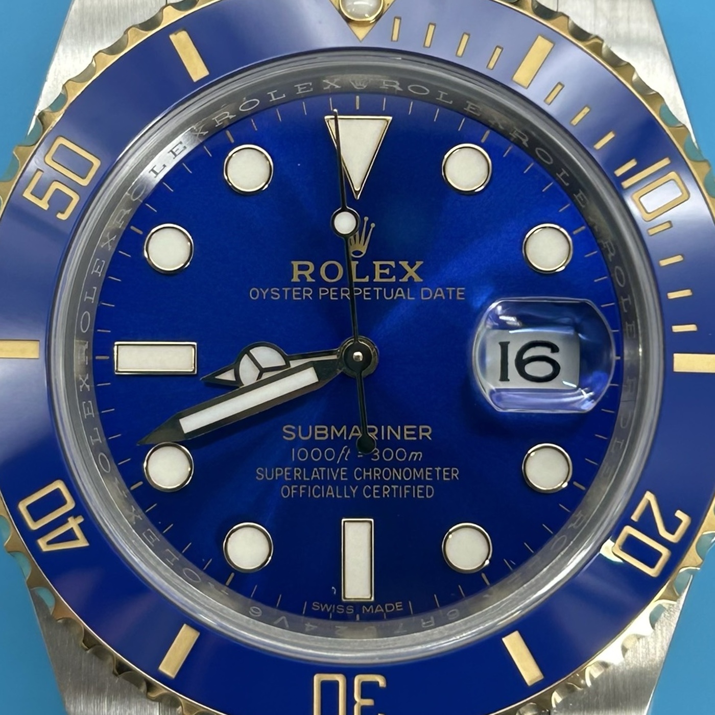 B04 · Camera geometry corrected. Image rotated approximately 0.3° counterclockwise at the dial centre; perspective and unequal image scaling normalized to a circular dial reference using the saved printed minute-track reference. Recentered and resampled to 1400 × 1400 pixels. No correction for crystal refraction or raised bezel/hand geometry.