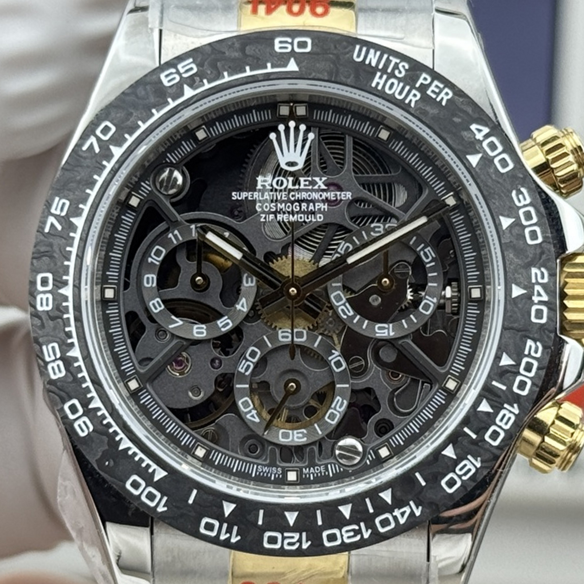 S002 · Camera geometry corrected. Image rotated approximately 2.3° clockwise at the dial centre; perspective and unequal image scaling normalized to a circular dial reference using detected printed tick centres. Recentered and resampled to 1900 × 1900 pixels. No correction for crystal refraction or raised bezel/hand geometry. Extended rays are visual dial references only; they do not correct or measure the raised bezel.