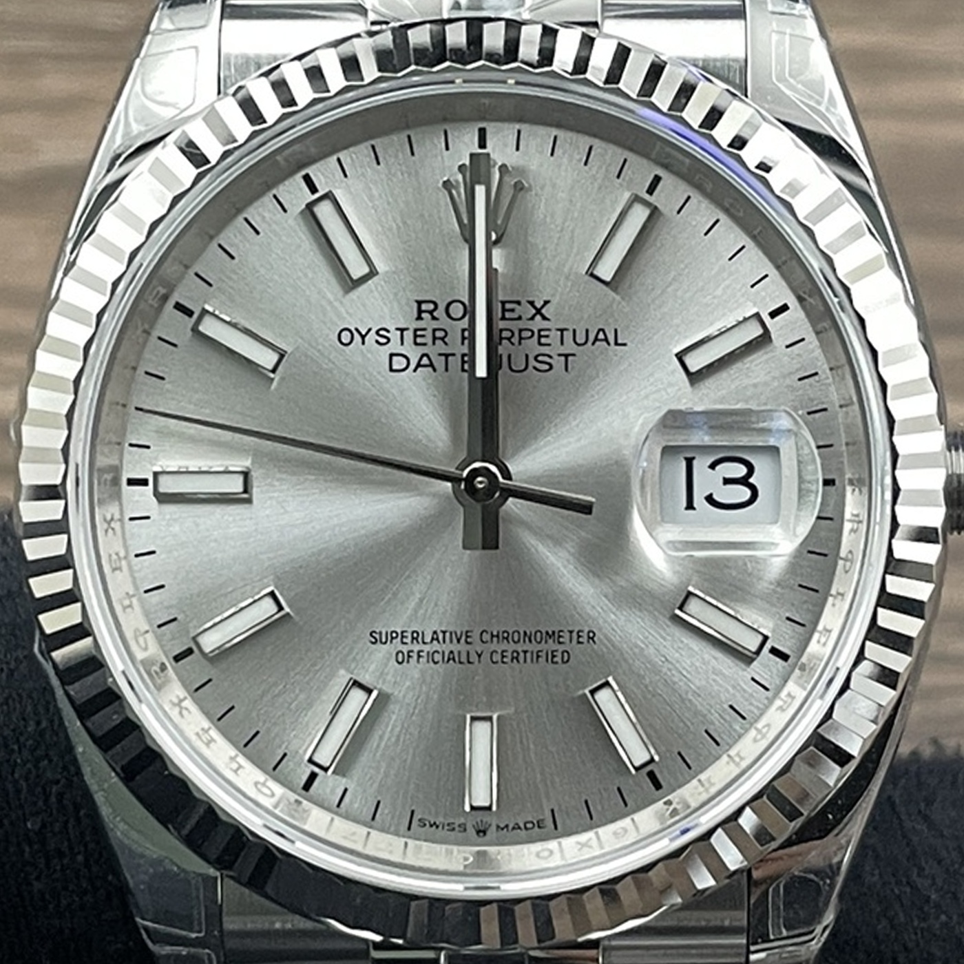 P02 · Visual reference only · precise angles unverified. Image rotated approximately 1.0° counterclockwise at the dial centre; illustrative circular normalization only; geometry did not validate using the saved printed minute-track reference. Recentered and resampled to 1400 × 1400 pixels. No correction for crystal refraction or raised bezel/hand geometry.