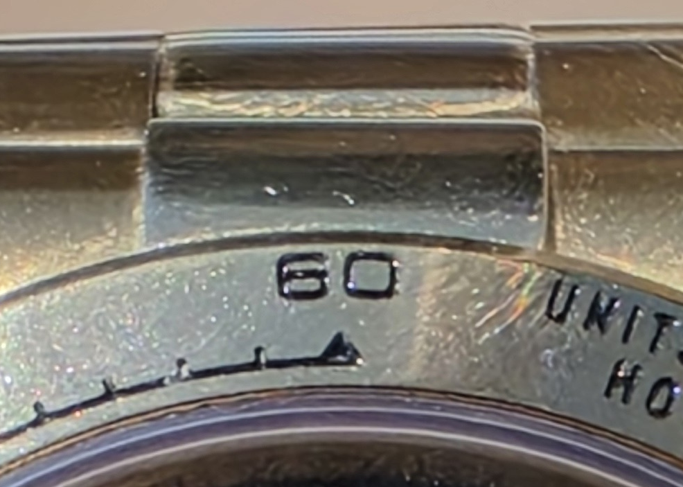 A · Bezel at twelve