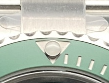P03 · Bezel at twelve