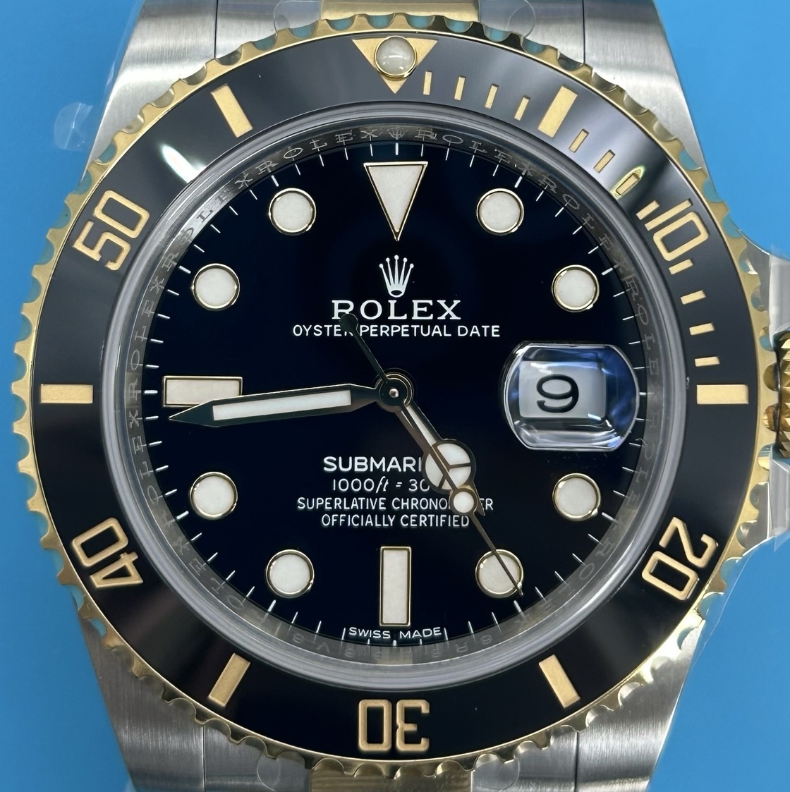S004 · Native full-bezel context. Raised bezel features assessed visually in this original camera view