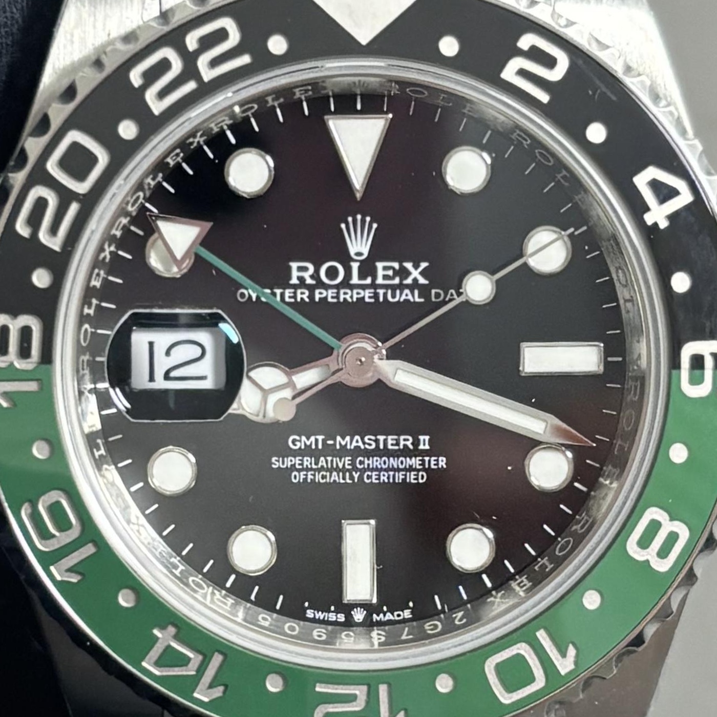 P04 · Visual reference only · precise angles unverified. Image rotated approximately 1.3° clockwise at the dial centre; illustrative circular normalization only; geometry did not validate using the saved printed minute-track reference. Recentered and resampled to 1400 × 1400 pixels. No correction for crystal refraction or raised bezel/hand geometry.