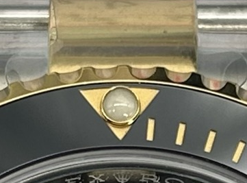 A02 · Bezel at twelve