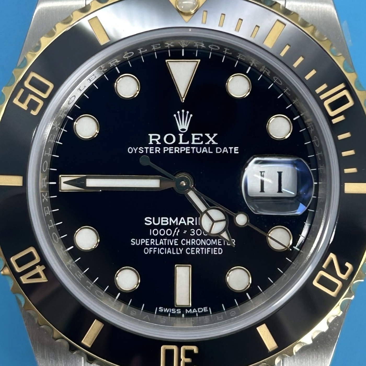 B05 · Visual reference only · precise angles unverified. Image rotated approximately 1.6° clockwise at the dial centre; illustrative circular normalization only; geometry did not validate using the saved printed minute-track reference. Recentered and resampled to 1400 × 1400 pixels. No correction for crystal refraction or raised bezel/hand geometry.