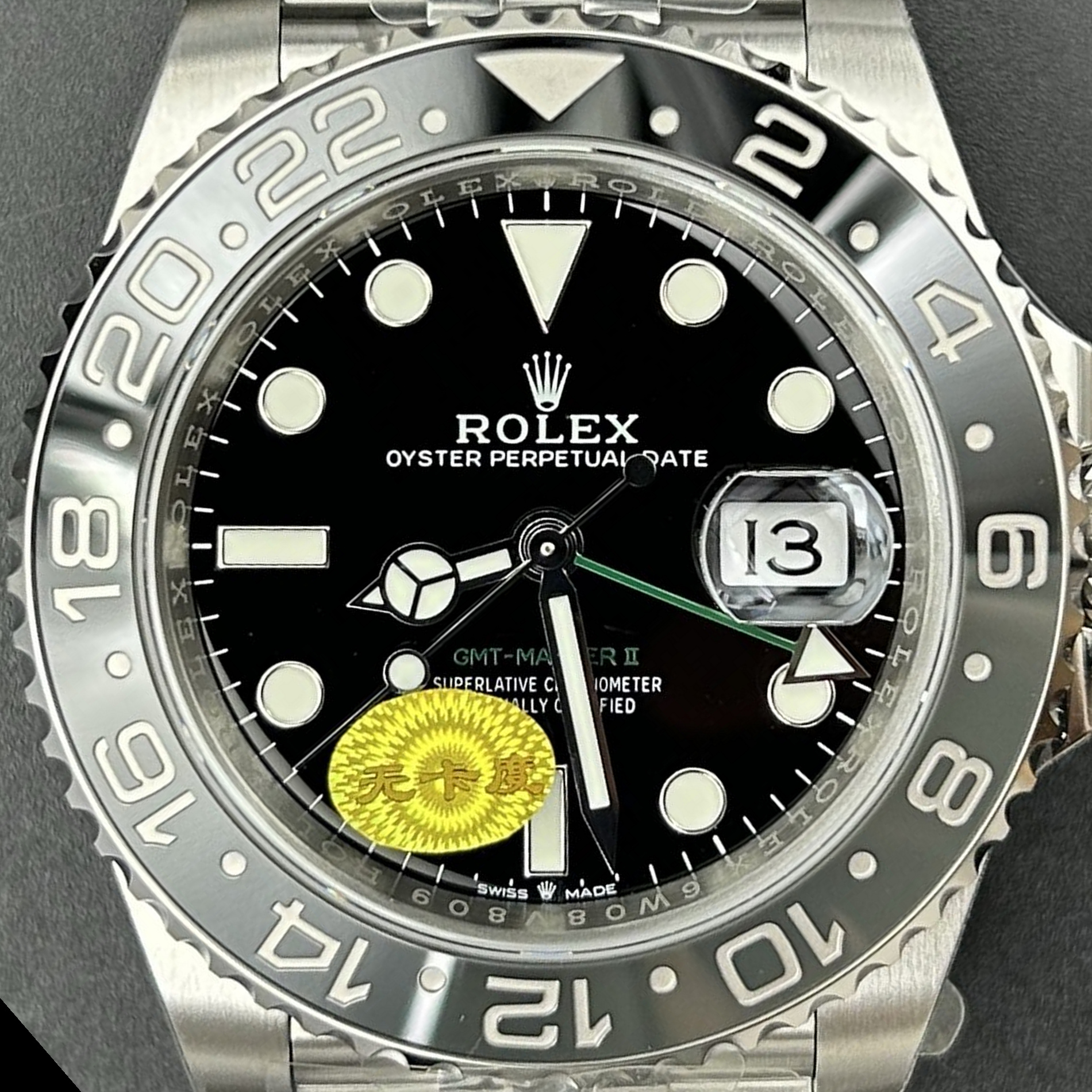 S005 · Camera geometry corrected. Image rotated approximately 40.8° counterclockwise at the dial centre; perspective and unequal image scaling normalized to a circular dial reference using isolated printed minute strokes. Recentered and resampled to 1900 × 1900 pixels. No correction for crystal refraction or raised bezel/hand geometry. Extended rays are visual dial references only; they do not correct or measure the raised bezel.