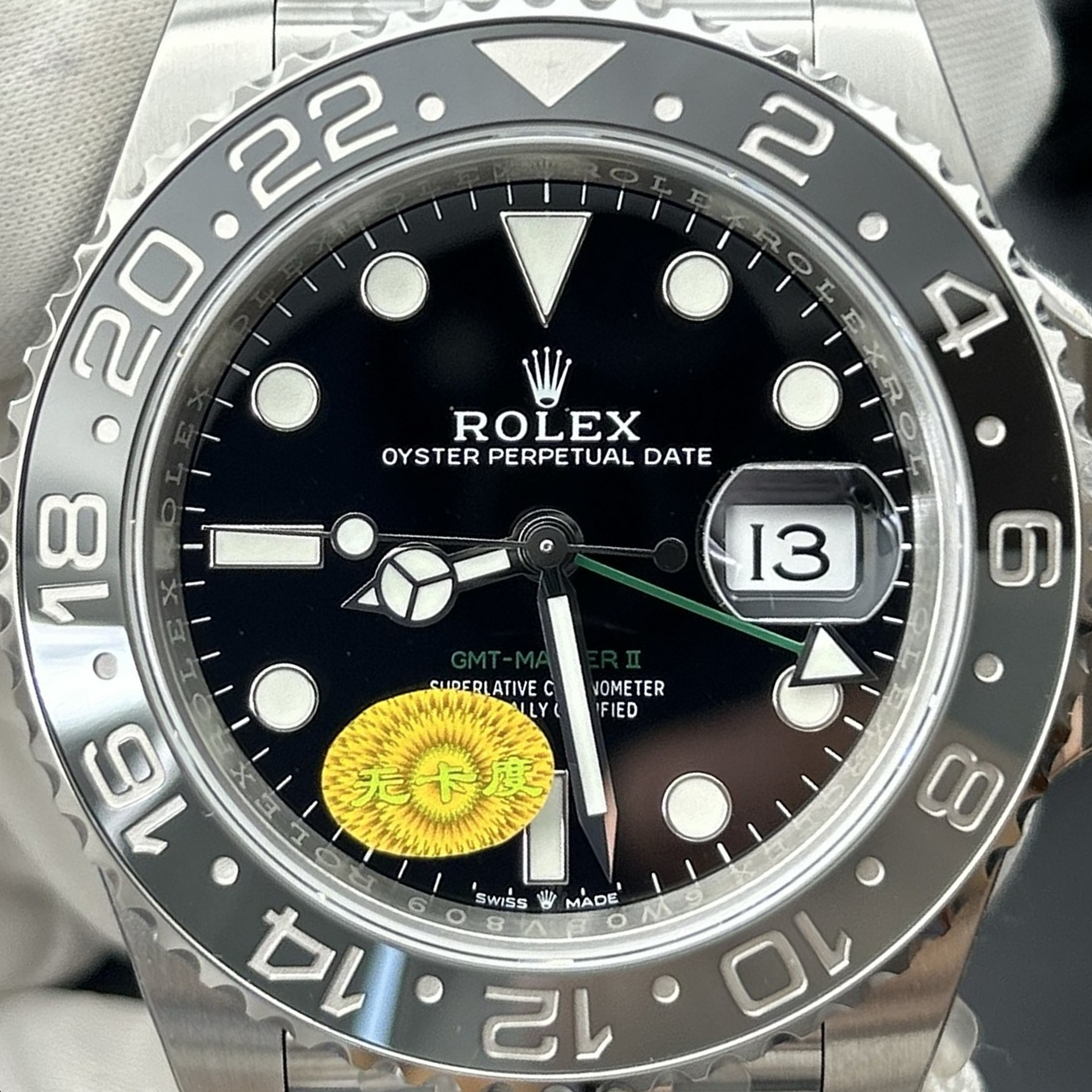 S008 · Camera geometry corrected. Image rotated approximately 28.2° counterclockwise at the dial centre; perspective and unequal image scaling normalized to a circular dial reference using the printed ticks’ inner tips after broad ink detection. Recentered and resampled to 1900 × 1900 pixels. No correction for crystal refraction or raised bezel/hand geometry. Extended rays are visual dial references only; they do not correct or measure the raised bezel.