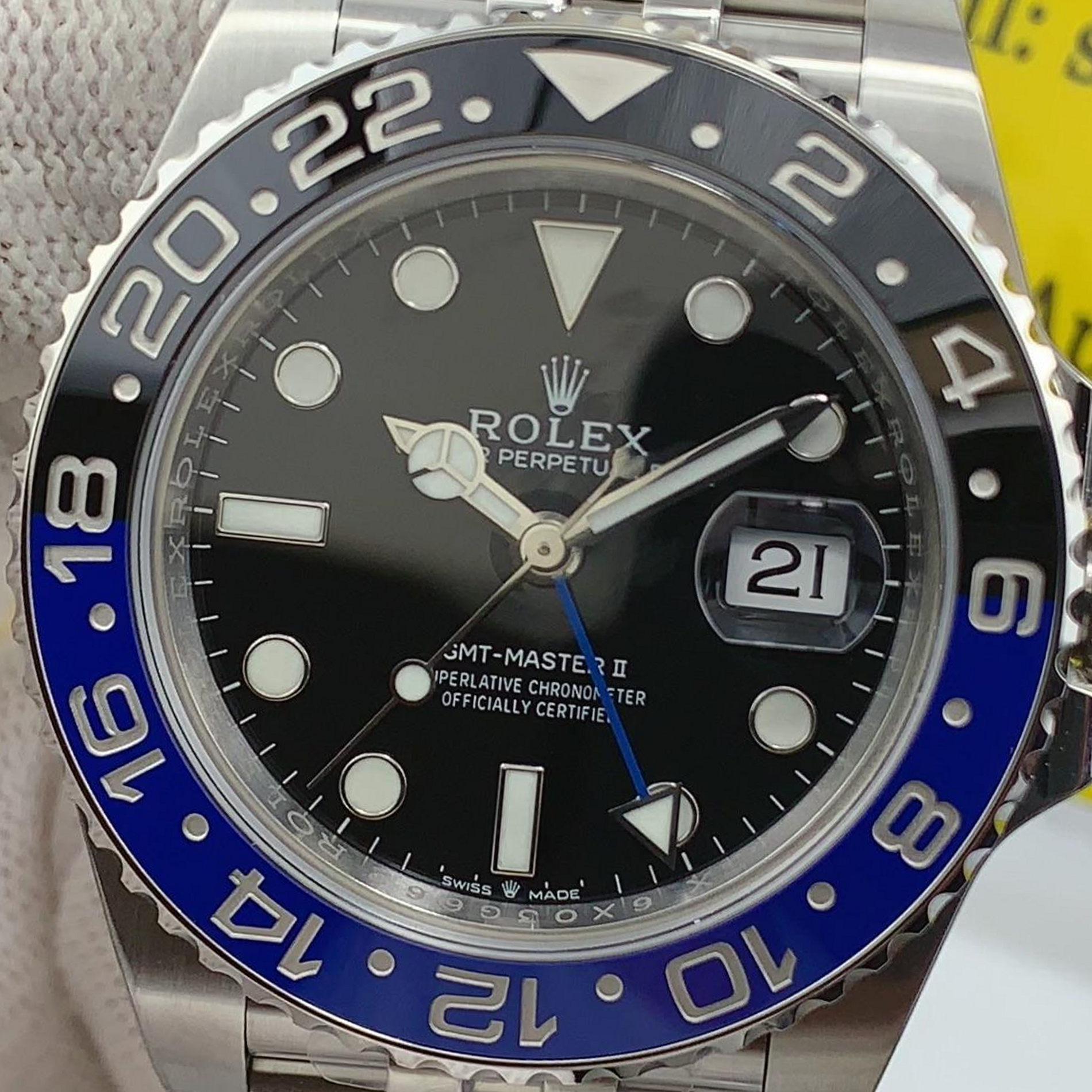 S002 · Camera geometry corrected. Image rotated approximately 5.1° clockwise at the dial centre; perspective and unequal image scaling normalized to a circular dial reference using isolated printed minute strokes. Recentered and resampled to 1900 × 1900 pixels. No correction for crystal refraction or raised bezel/hand geometry. Extended rays are visual dial references only; they do not correct or measure the raised bezel.